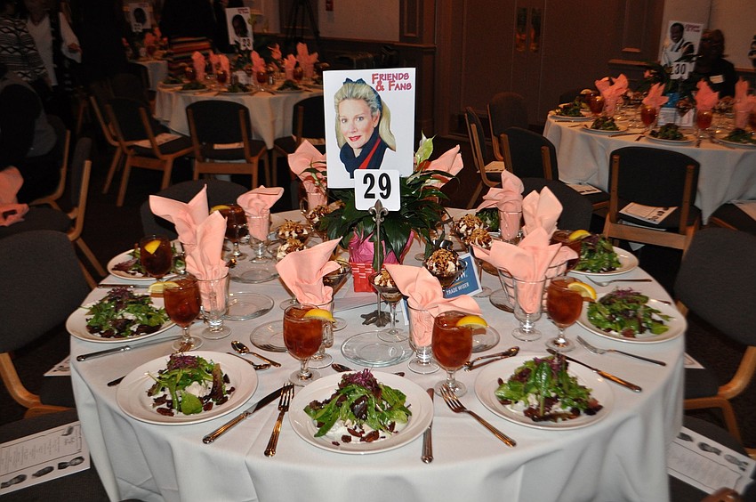 The tables were decorated with signs with photos of the honorees.