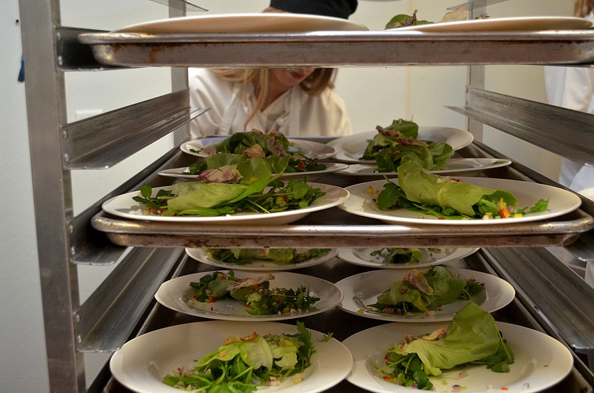 An arugula salad with shaved beets, truffle oil and Parmesan crisp was on the menu USF Sarasota-Manatee students created and prepared for HospitaBull Evening.
