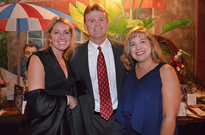 Sheryl Vieira with Charles and Susan Hines
