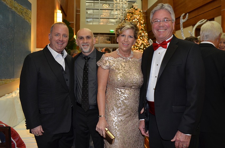 Terri McKee and Michael Scaildone with Coral and Michael Pleas