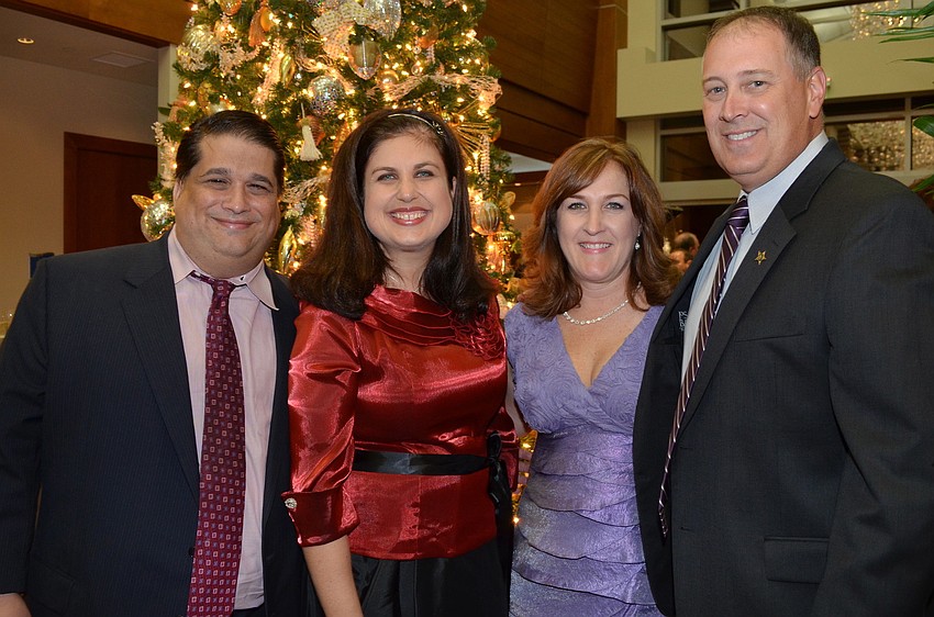 Eric and Rebecca Robinson with Tracy and Tom Knight