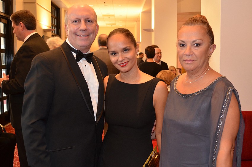 Michael and Jessica Rogers with Maria Elena Macis