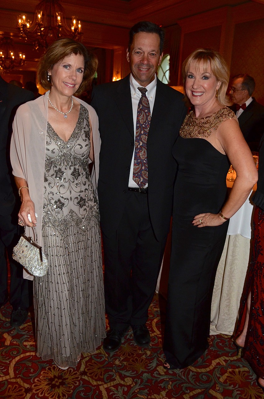 Jill and Scott Levine with Teri Hansen