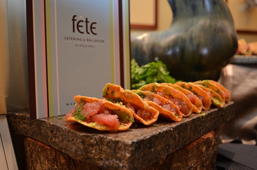 Chef Brian Pierce from Polo Grill and Bar prepared ahi tuna tacos at the Signature Chefs Auction.