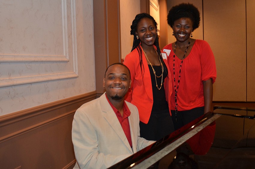 Marvin Hendon on the piano with Keliy Fordham and Samone Hicks