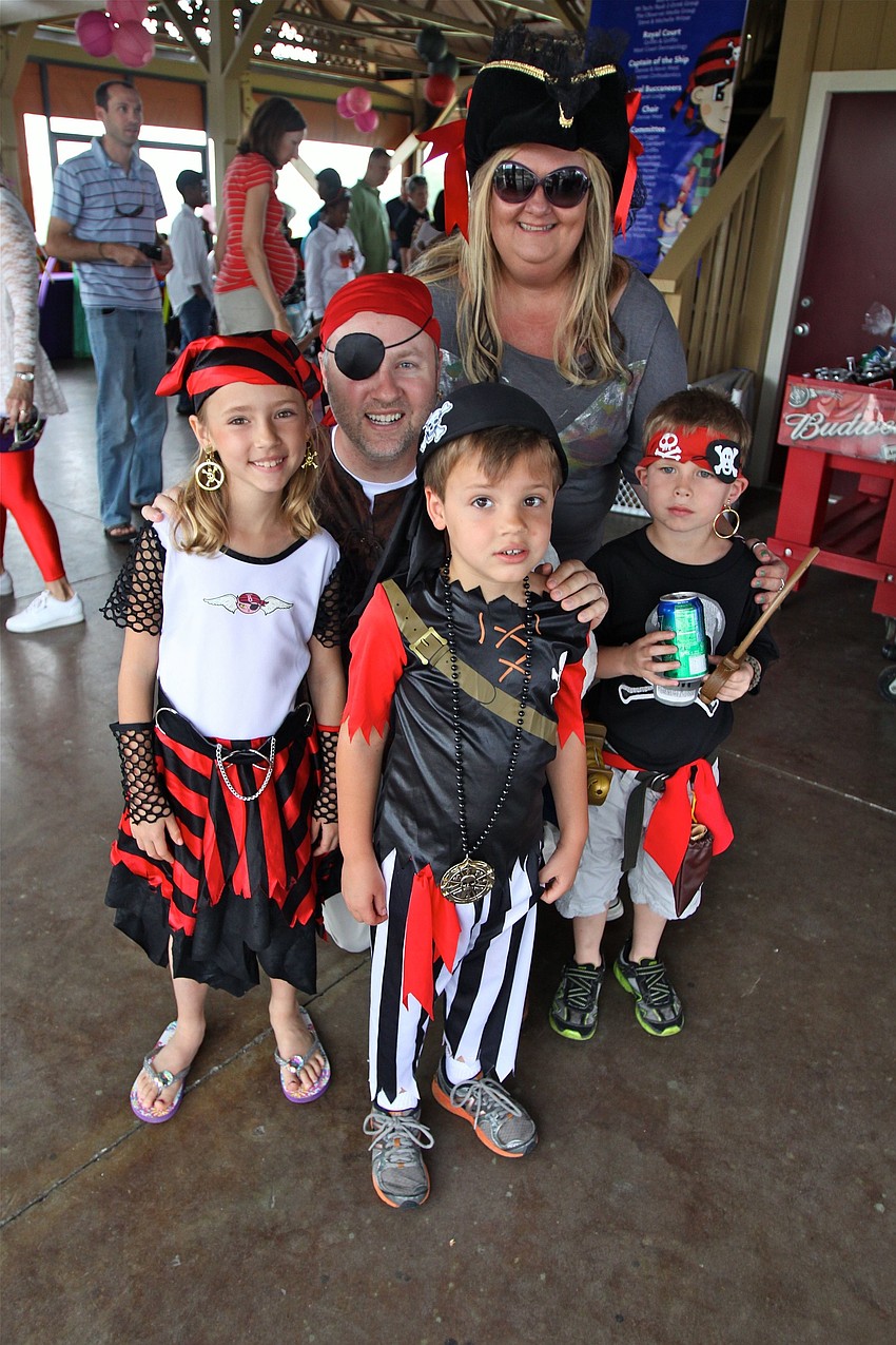 John Kramer and Sandy Murray with Lexie Kramer, 7, Blake Kramer, 5, and Jameison Harney, 5.