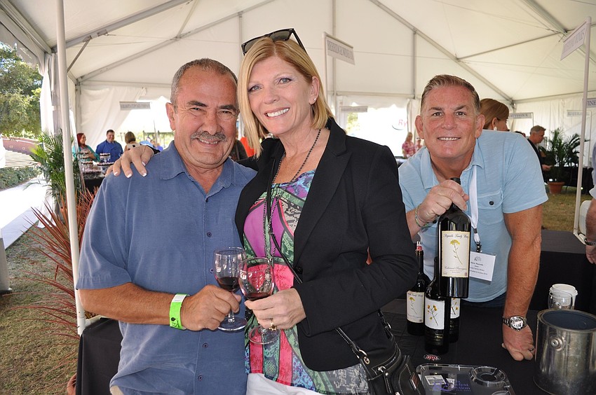 Mongo and Sarah Marich pose with winemaker Steve Reynolds
