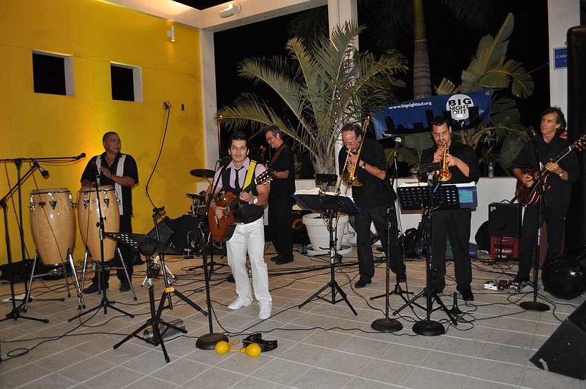 Big Night Out played by the pool.