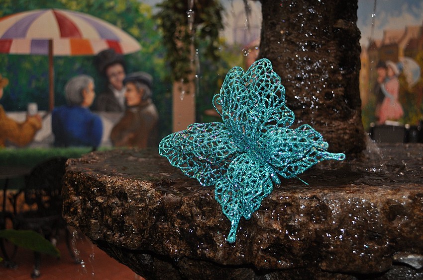 One of the many sparkly butterflies that decorated Michaelâ€™s On East.