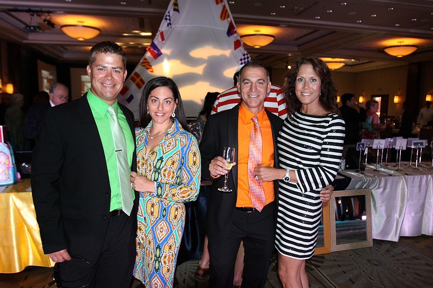 Nick and Samantha Dzembo with Mike and Diane Lacenere