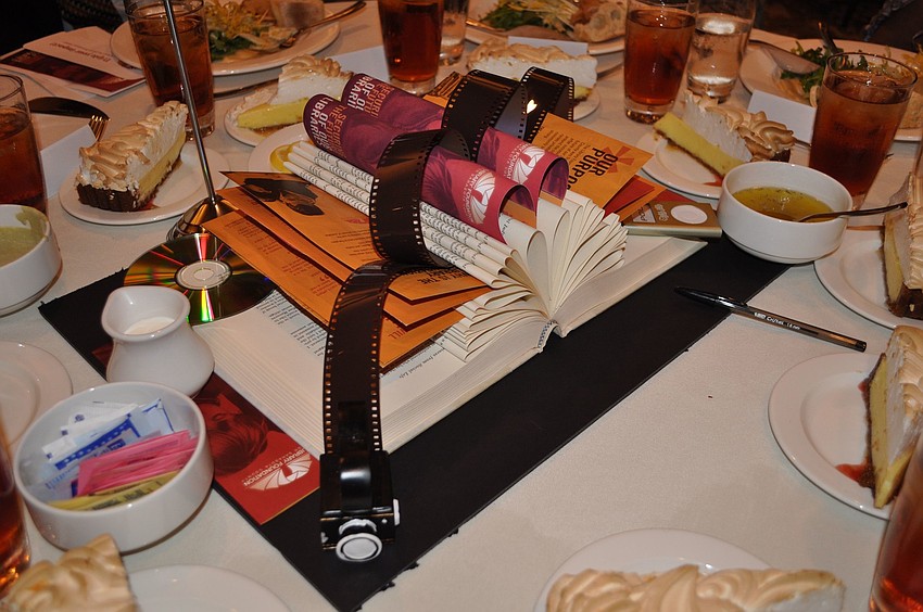 Each centerpiece featured books or computers and other aspects of things offered at the local libraries.