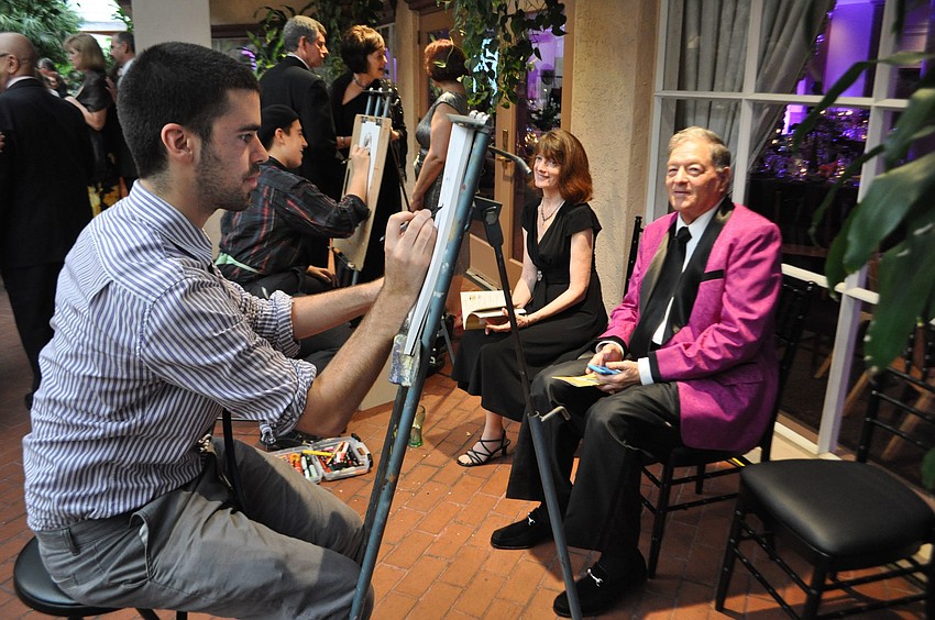 Eric De Barros and Van Jazmin did caricatures of Suanne Pomponio and Bruce Lesser.