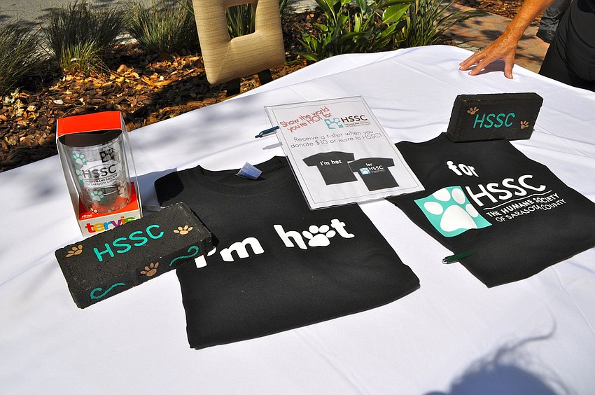 Tervis tumblers, bricks and t-shirts were for sale at the Humane Society of Sarasota Countyâ€™s table outside the Francis.