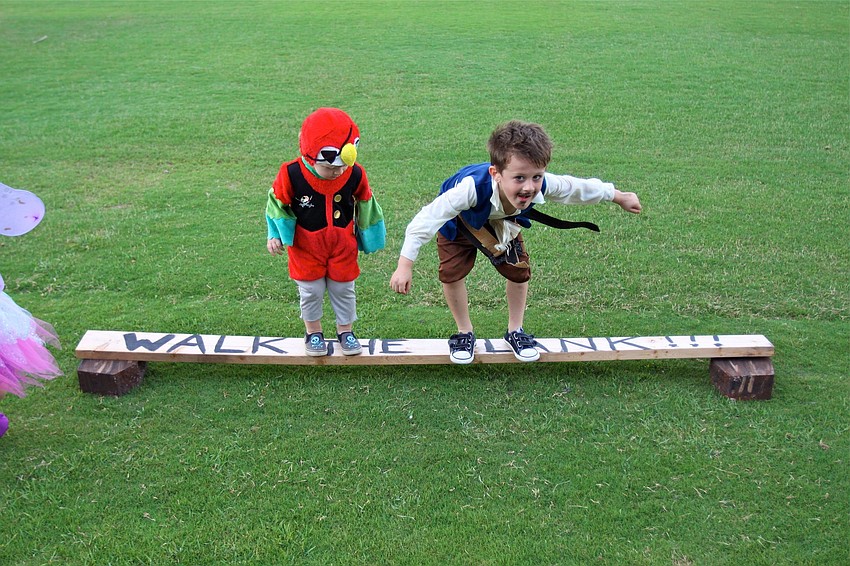 Camden, 2, and Colt, 5, Chalmers â€œwalk the plankâ€.
