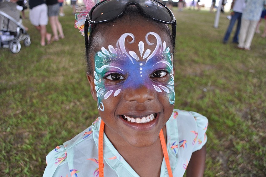 Amari Drummond, 6, had her face painted at Sip and Soar.