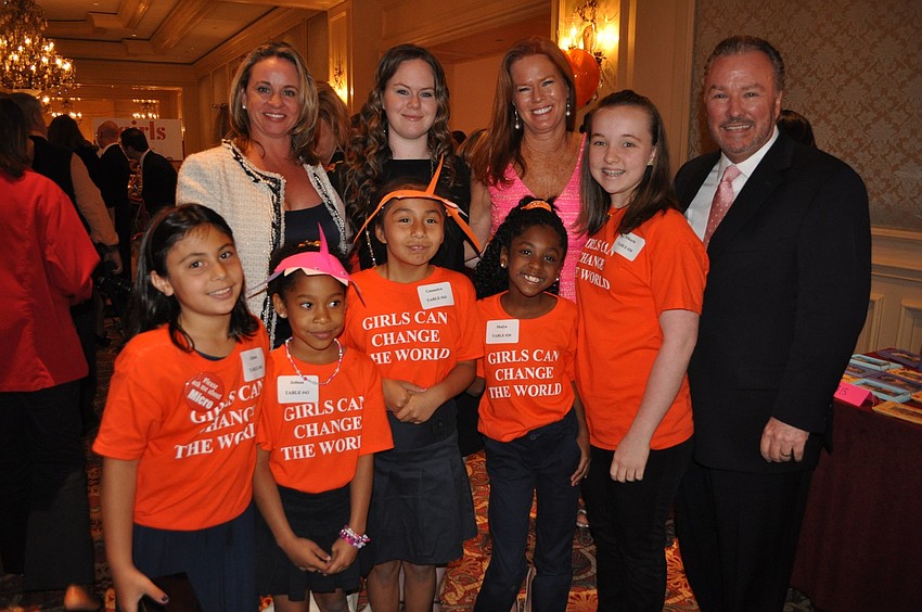 Gwen Kruse, Cears Crew, Terri Klauber and Michael Klauber with Girls Inc. girls Alison, Jolissa, Cazandra, Shaiya and Mikayla Klauber