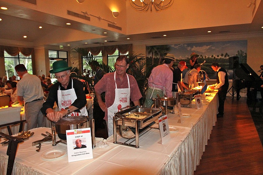 Chefs set themselves up at their stations.