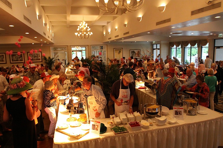 Guests had fun trying out different dishes made by the men who volunteered to cook for the Third Annual Men Who Cook event at Longboat Key Club Harbourside.