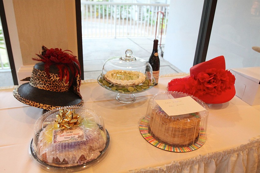There was an old fashioned cake auction as well as the selling of hats.