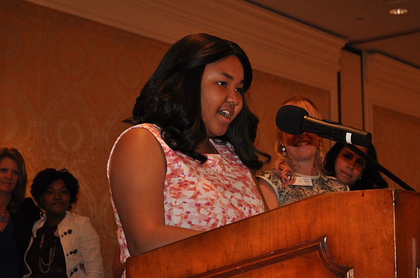Zandy Sanders speaks to the crowd at the 25th Celebration Luncheon.