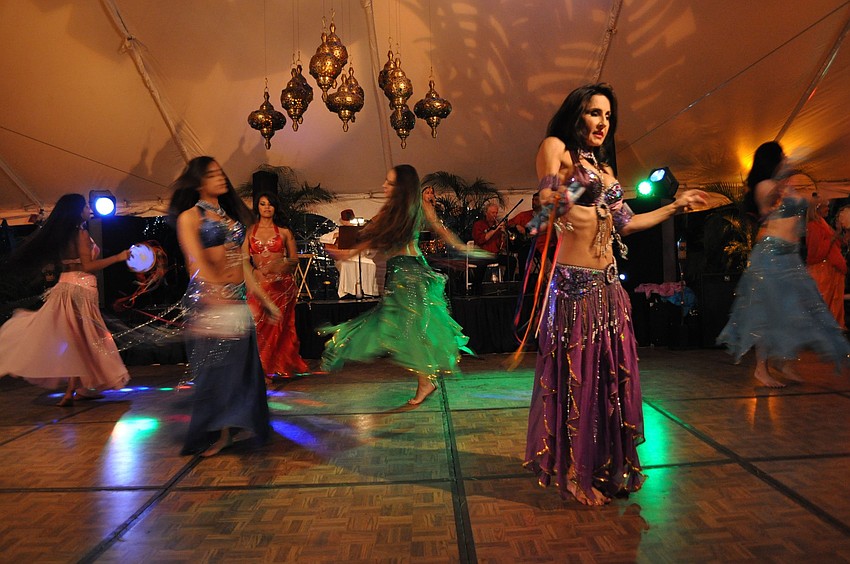 Dancers from International Productions by Tahja perform on the dance floor underneath the tent.