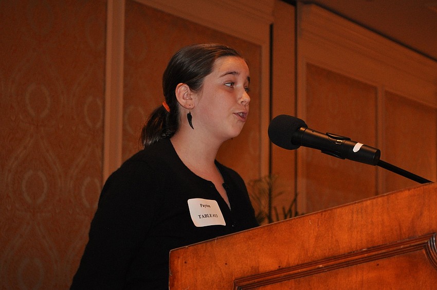 Payton Saturen introduces â€œShe Knows Where Sheâ€™s Goingâ€ honoree, Lisa Walsh.