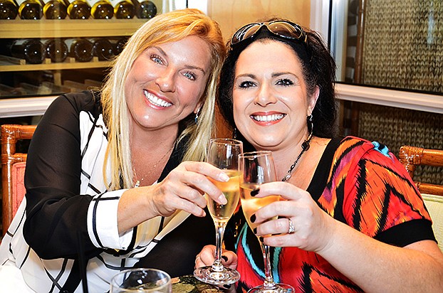 A toast with Denise Hirt and JoAnne Hampton, an 11-year breast cancer survivor