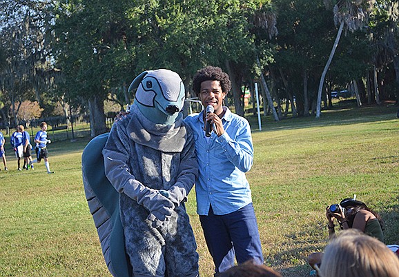 Emmanuel Avraham with the Ringling mascot
