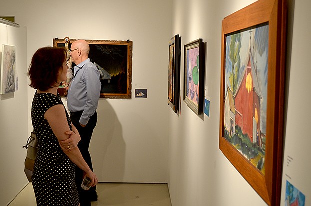 Guests admire the art