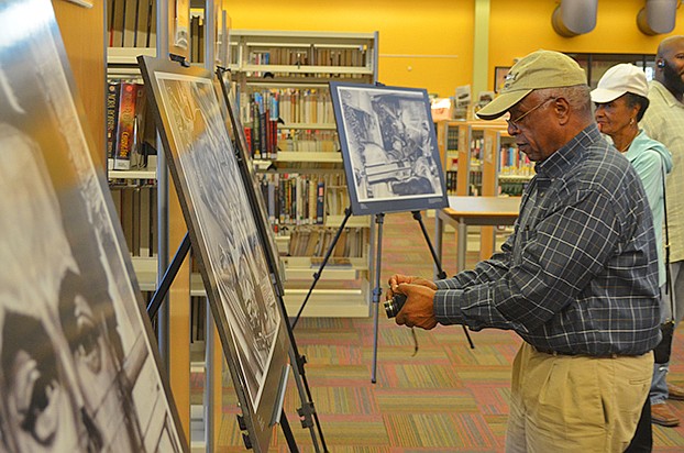 Guests admire the artwork