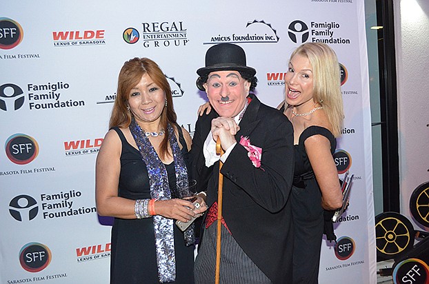 Noriko and CHuck Sidlow with Liz Flower