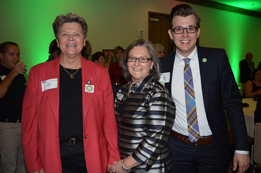 Honoree Cindy Barnes, Co-Chair Maria Foote and Michael Farmer
