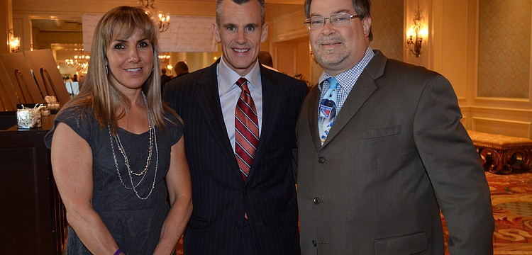 Chris and Coach Billy Donovan with ESPN's Howie Schwab