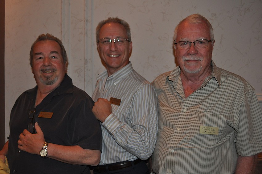 Dick Anderson, Gary Behnke and John P. Blue