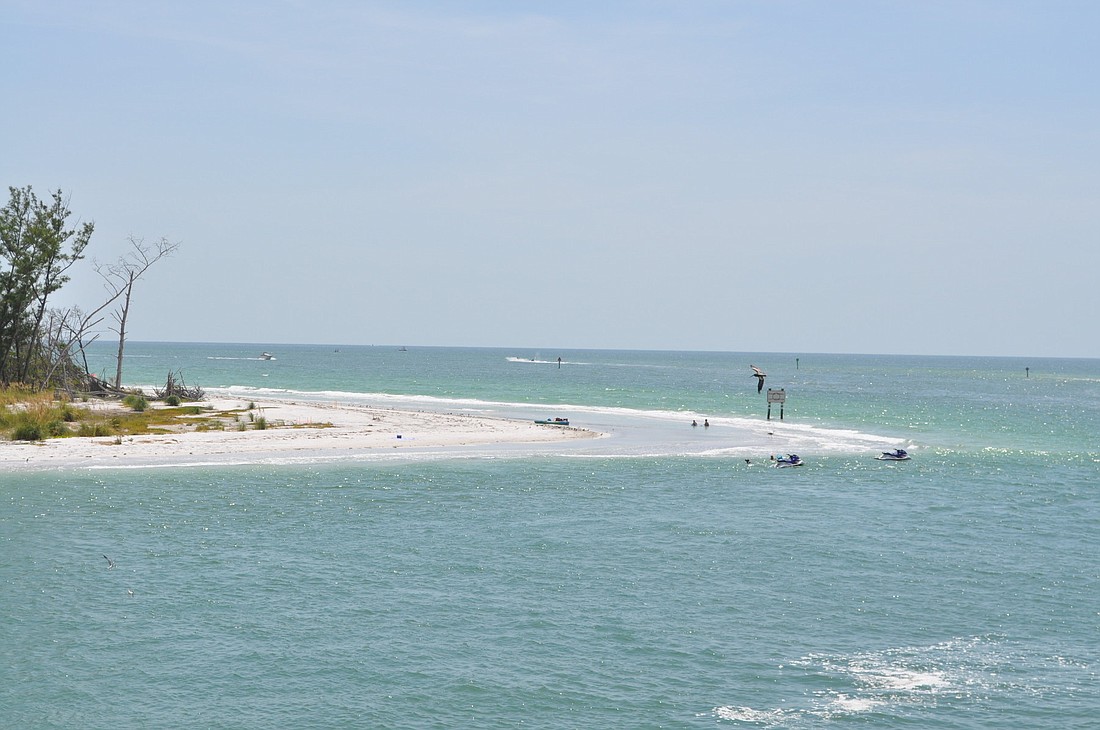 A plan to construct three groins on the north tip of Longboat Key to hold sand in the area is being challenged by former Manatee County Commissioner Joe McClash.