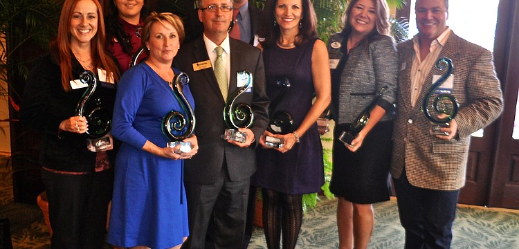Winners of the 2013 Sandies awards â€” Back left: Jules Price; Amanda Vercheski; Chris Deleonardo. Front left: Judy Athari; Marc Simms; Violetta Huesman; Annette Gueli; Tommy Klauber.