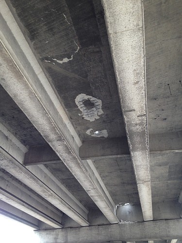 The accident resulted in three holes in the I-75 overpass. Photo courtesy of Lauren Hatchell.