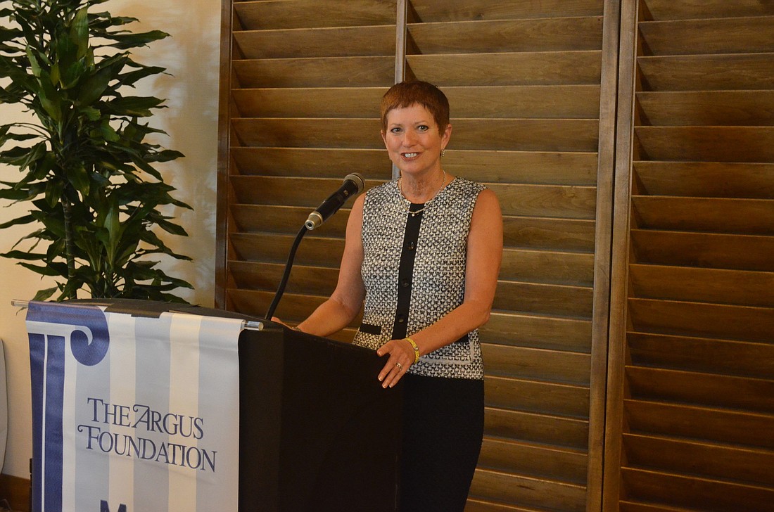 Gwen MacKenzie speaks at an Argus Foundation luncheon in May 2013. MacKenzie will step down next month after nearly 10 years as president and CEO of Sarasota Memorial Hospital Health Care System.