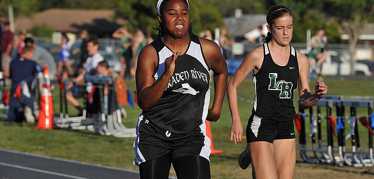 Track2-Braden River junior Kayla Gray edges past Lakewood Ranchâ€™s Olivia Ogles to win the 100-meter dash. Photos courtesy of Tom Hubbard.