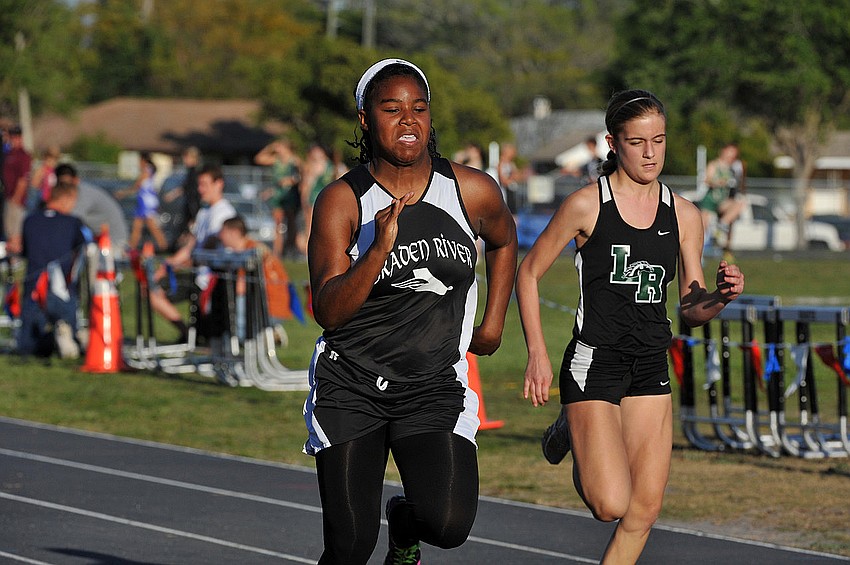 Track2-Braden River junior Kayla Gray edges past Lakewood Ranchâ€™s Olivia Ogles to win the 100-meter dash. Photos courtesy of Tom Hubbard.
