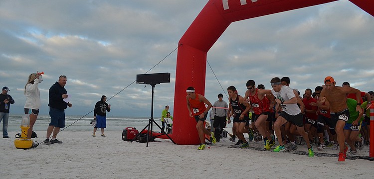 Runners take off at the blare of the horn.