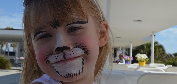 Oliviah Hohneke attends the picnic with her parents.