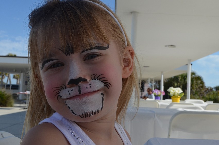 Oliviah Hohneke attends the picnic with her parents.
