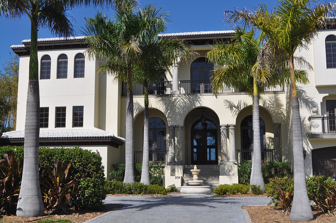 This home at 204 Bird Key Drive has five bedrooms, five bathrooms, one half-bath, a pool and 7,992 square feet of living area. It sold for $3,085,000.