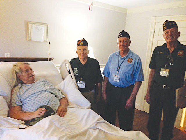Representatives from the Veterans of Foreign Wars honored Bob Craft in a bedside service. Courtesy photo.