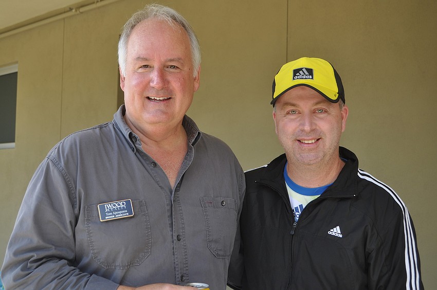 Tom Aposporos of J. Wood Realty and Tony Driscoll of the Sarasota Open