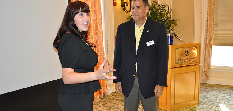 Blair Bloomston, vice president of game on Nation, delivered one of four exercises that increase competition, mystery, humor and empowerment in the workplace. Doug Phillips watched.