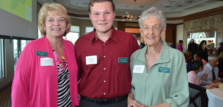 Chair of People for Trees Alice White, Melissa Scolaro Youth â€“ Adult Partnership Award recipient Cody Huntley and Director of People for Trees Valerie Ollinger