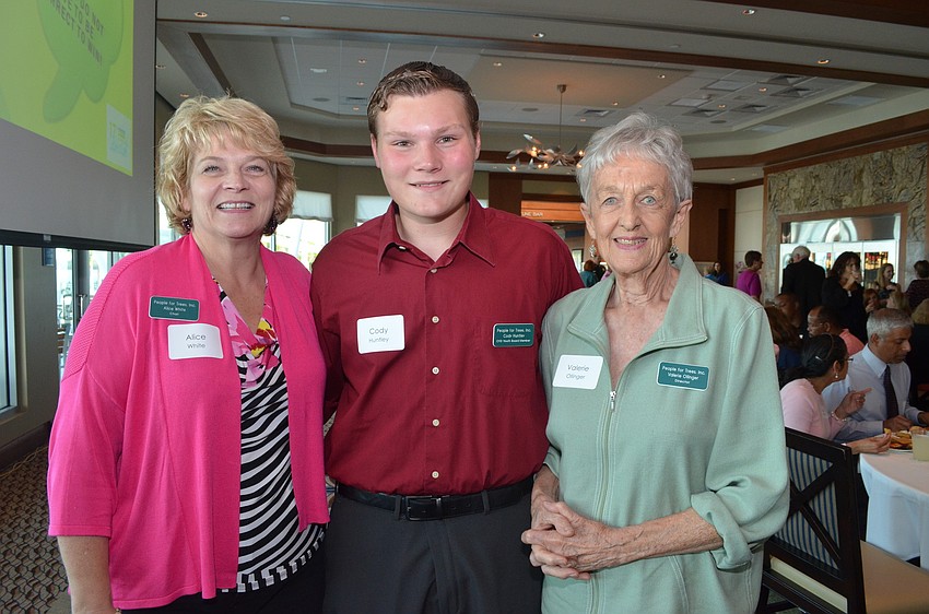 Chair of People for Trees Alice White, Melissa Scolaro Youth â€“ Adult Partnership Award recipient Cody Huntley and Director of People for Trees Valerie Ollinger