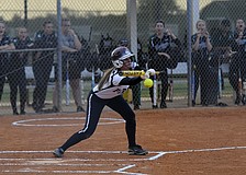 Braden River senior Ashley Allard puts down a sacrifice bunt in the first inning.